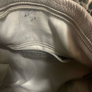 Gently used Metallic Color Coach Bag in Very good condition